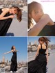 A woman in a black dress standing on top of a building.